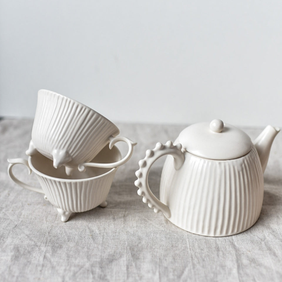 Tea set White Pearl of a teapot and 2 mugs on legs