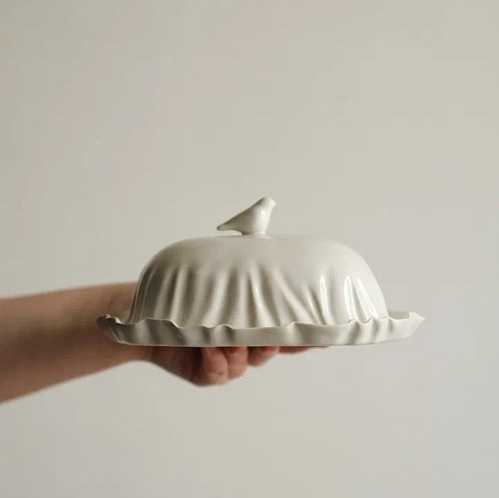Handmade butter dish with a bird on the lid